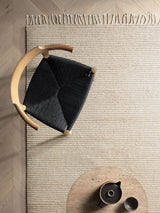 Armadillo Malawi Rug in Chino, a second view of the hand-knotted wool rug in a styled interior