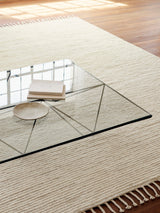 Armadillo Malawi Rug in Tapioca, hand-knotted wool rug shown in a room setting