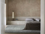 Armadillo Malawi Rug in Crane, overhead view of the hand-knotted wool weave and edge finish