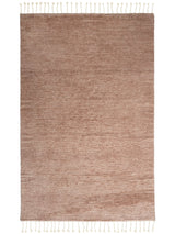 Armadillo Malawi Rug in Blush, a second view of the hand-knotted wool rug in a styled interior