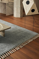 Armadillo Malawi Rug in Crane, a second view of the hand-knotted wool rug in a styled interior