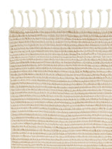 Armadillo Malawi Rug in Chino, corner close-up of the wool pile and edge