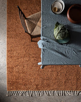 Armadillo Malawi Rug in Saffron, a second view of the hand-knotted wool rug in a styled interior