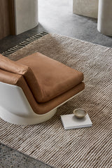 Armadillo Malawi Rug in Mushroom, a second view of the hand-knotted wool rug in a styled interior