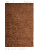 Armadillo Malawi Rug in Saffron, overhead view of the hand-knotted wool weave and edge finish