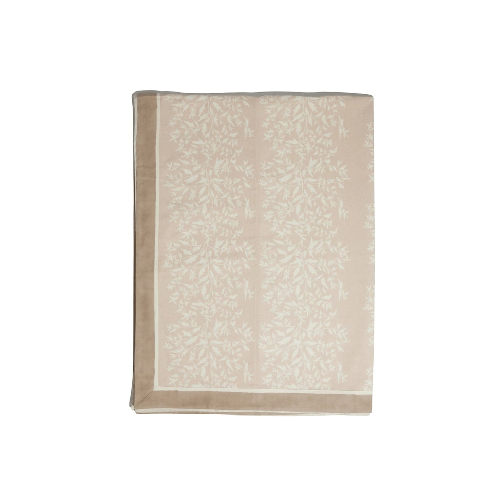 Maison Venu Marguerite tablecloth in primrose sand featuring a white hand block-printed botanical vine floral motif.