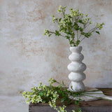 Artificial Meadow Daisy by Abigail Ahern styled in a vase, showing soft bloom tones and naturalistic stem