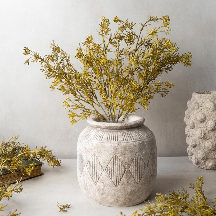Meadow grass flaxen stem styled in floral arrangement, light airy texture for organic display