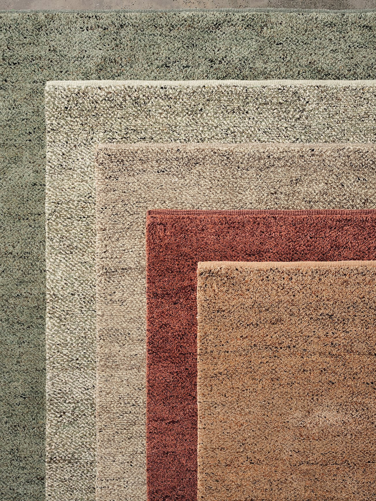 Meadow Rug by Armadillo, hand-knotted wool rug, styled in a room at Calimia Home