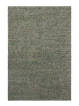 Armadillo Meadow Rug in Seagrass, a second view of the hand-knotted wool rug in a styled interior
