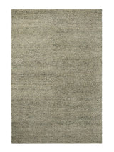 Armadillo Meadow Rug in Pistachio, overhead view of the hand-knotted wool weave and edge finish