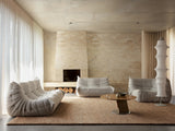 Armadillo Meadow Rug in Tamarillo, overhead view of the hand-knotted wool weave and edge finish