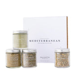 Calicutts Home Mediterranean gift set featuring four glass jars of herb-filled spice blends in a white presentation box.