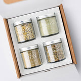 Calicutts Mediterranean gift set featuring four glass jars of all-natural, herb-filled spice blends in a gift box.