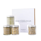Four jars of spices with a box labeled 'Mediterranean Spice Blend Collection' by Calicutts Spice Co on a white background.