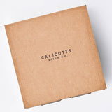Calicutts Mediterranean gift set in a square brown cardboard box with Calicutts Spice Co. branding