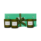 Flamingo Estate Mini Three Sisters Candle Gift Set: three small green glass candles in Sage, Tomato, and Rosemary in a branded green gift box.