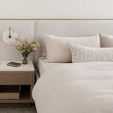 Mira Long Lumbar Pillow by One Bi One — Belgian linen with tasseled corners and wool embroidery, handcrafted in Gothenburg, Sweden
