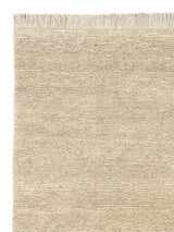 Armadillo Mojave Rug in Cashew, corner close-up of the jute pile and edge