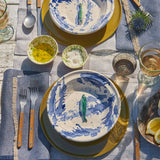 Hand-thrown Italian terra cotta serving dish in blue splatter glaze