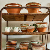 Hand-thrown Italian terra cotta serving dish in green splatter glaze