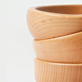 Close-up of Farmhouse Pottery wooden utility bowl, natural wood grain
