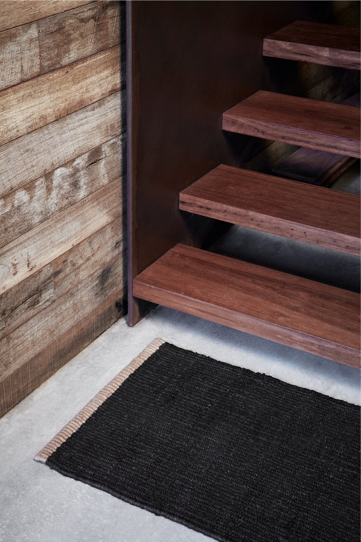 Nest Nook Rug by Armadillo, handwoven jute flatweave rug, styled in a room at Calimia Home