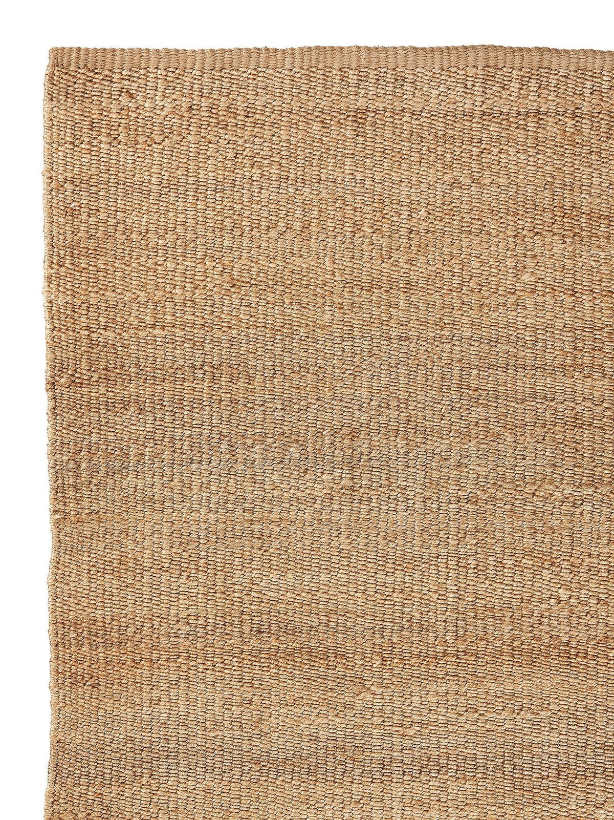 Armadillo Nest Nook Rug in Natural, corner close-up of the jute pile and edge