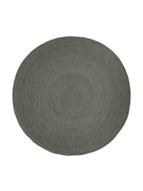 Armadillo Nimbus Rug in Oakmoss, overhead view of the hand-braided new zealand wool weave and edge finish