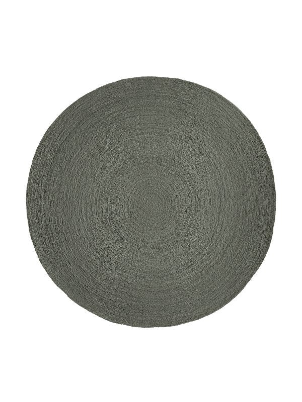 Armadillo Nimbus Rug in Oakmoss, overhead view of the hand-braided new zealand wool weave and edge finish