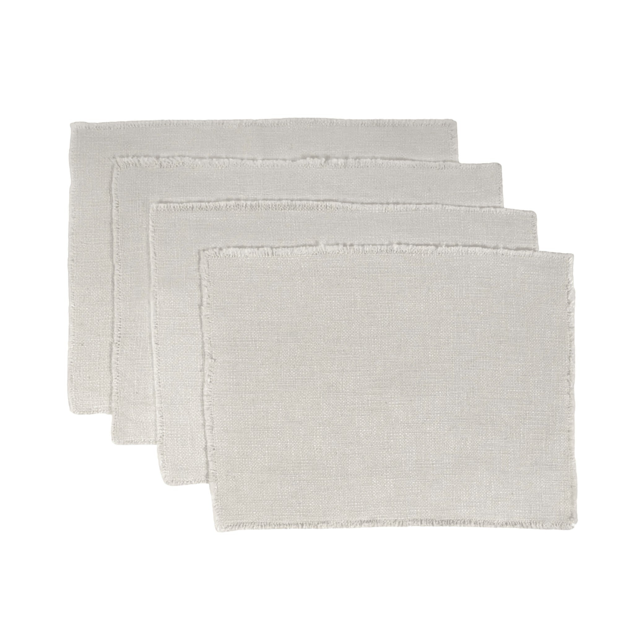 Pom Pom At Home Oakville natural linen-cotton blend placemats with frayed edges, set of four.