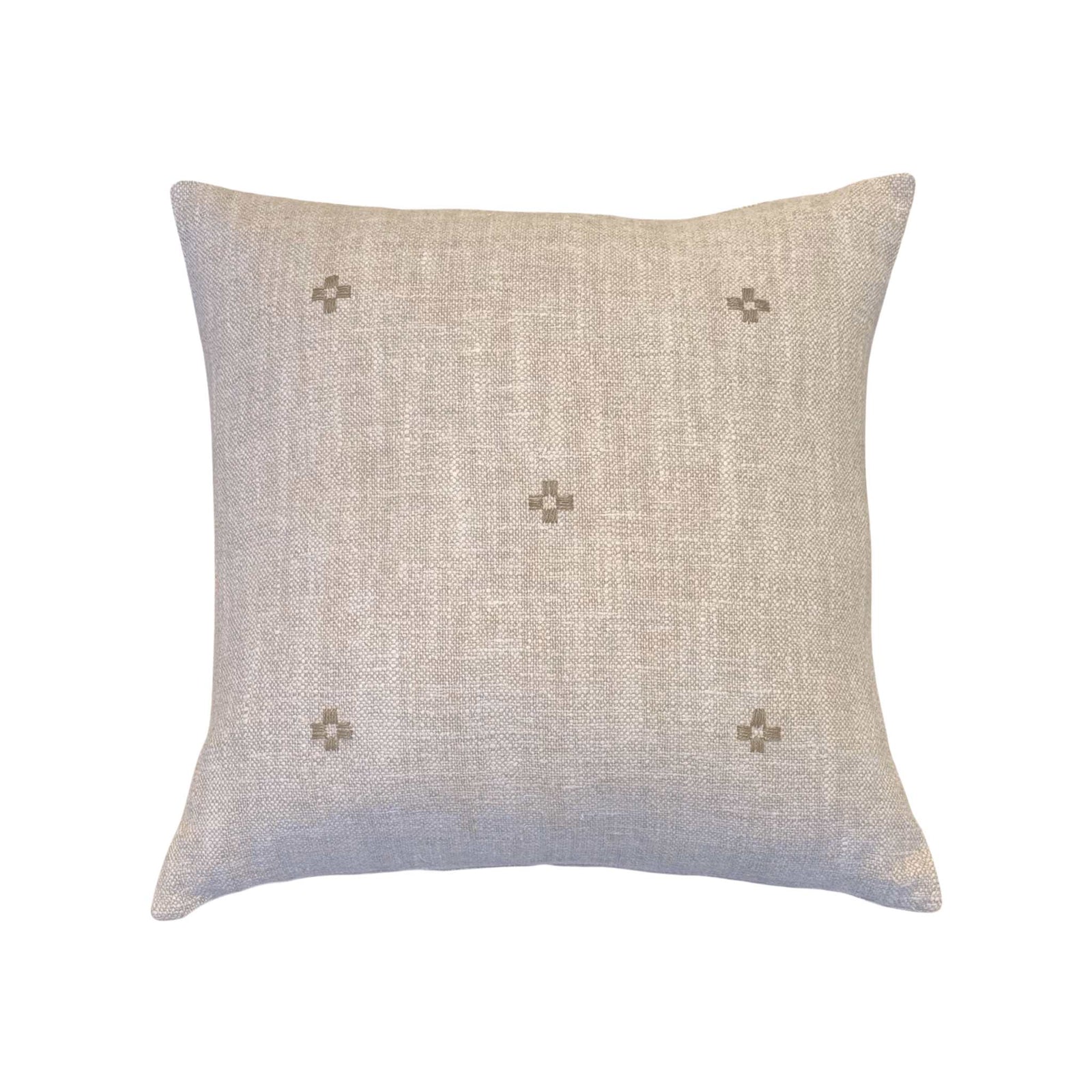 Isak Taupe Pillow by One Bi One — hand-embroidered Belgian linen in caramel taupe, available in 18×15" and 16×16", handcrafted in Gothenburg, Sweden