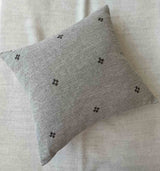 Isak Gray Pillow — full view showing the hand-embroidered linen surface and premium feather-down fill