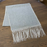 Elise Gray & Cream Table Runner by One Bi One — Belgian linen with hand-embroidered gray and cream accent and tassels, handcrafted in Gothenburg, Sweden