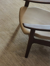Armadillo Odessa Rug in Travertine, a second view of the hand-knotted afghan wool rug in a styled interior