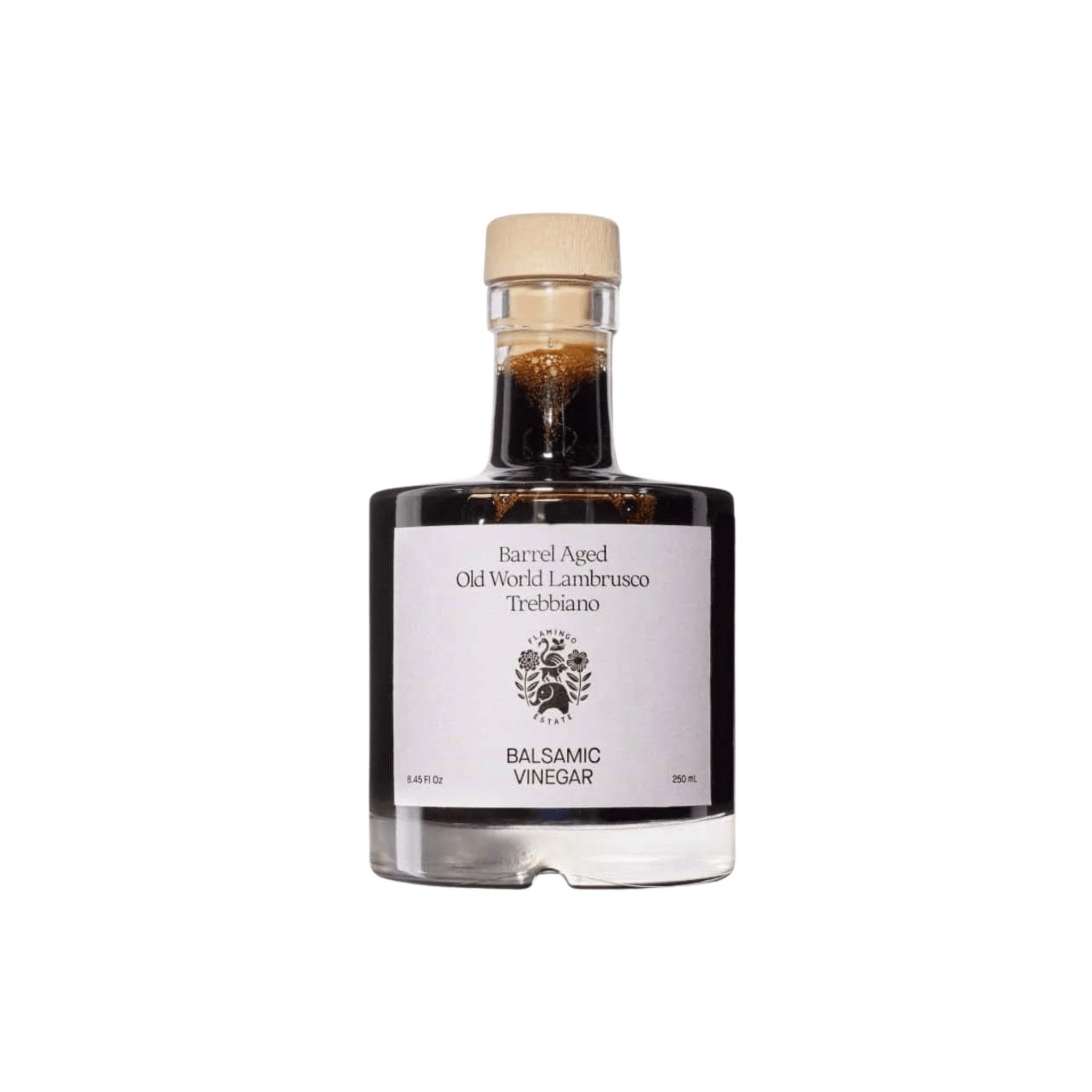 A small square Flamingo Estate Organic Balsamic Vinegar bottle with a cream label, on a white background.