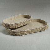 Oval Raffia Tray with Leather Trim styled on a coffee table or console