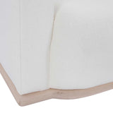 Calimia Home Owens Sofa in white Belgian linen with a natural oak plinth base and curved silhouette