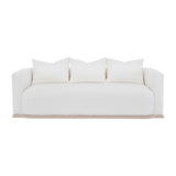 Calimia Home Owens Sofa in white Belgian linen with a curved back and natural oak plinth base on a white background.