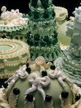 Prinsesstårta Candle lifestyle shot — candle styled with holiday botanicals