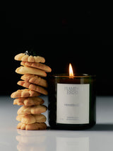 Prinsesstårta Candle among holiday greenery and seasonal decor