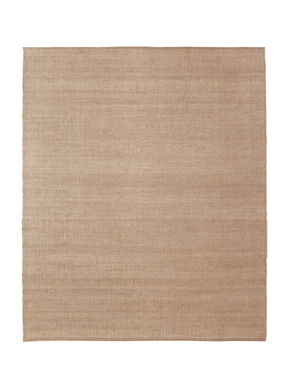 Armadillo Palloza Rug in Rattan, a second view of the handwoven jute flatweave rug in a styled interior