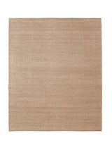 Armadillo Palloza Rug in Rattan, a second view of the handwoven jute flatweave rug in a styled interior