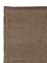 Armadillo Palloza Rug in Shale, overhead view of the handwoven jute flatweave weave and edge finish