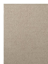Armadillo Pebble Rug in Whippet, corner close-up of the hand-spun new zealand wool pile and edge