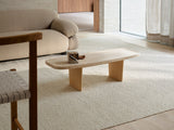 Armadillo Pebble Rug in Tofu, overhead view of the handwoven boucle wool weave and edge finish