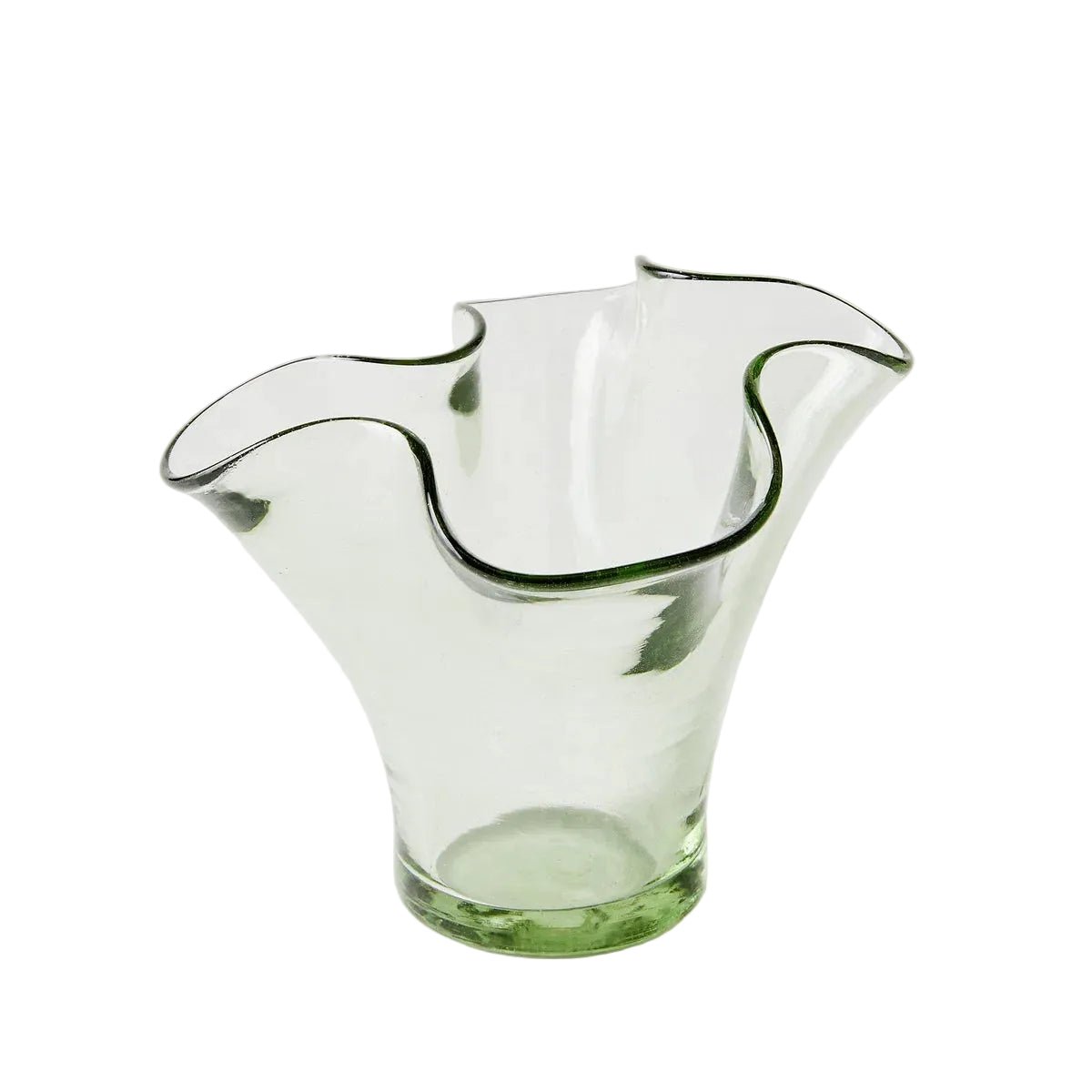 Clear glass vase with wavy design on a white background