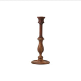 Calimia Home Piccola black Siris wood candle stick with a classic turned stem and sturdy base on a white background.