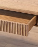 Detail of the Pieter desk reeded drawer front, open