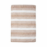 Striped rug with brown and white stripes on a white background